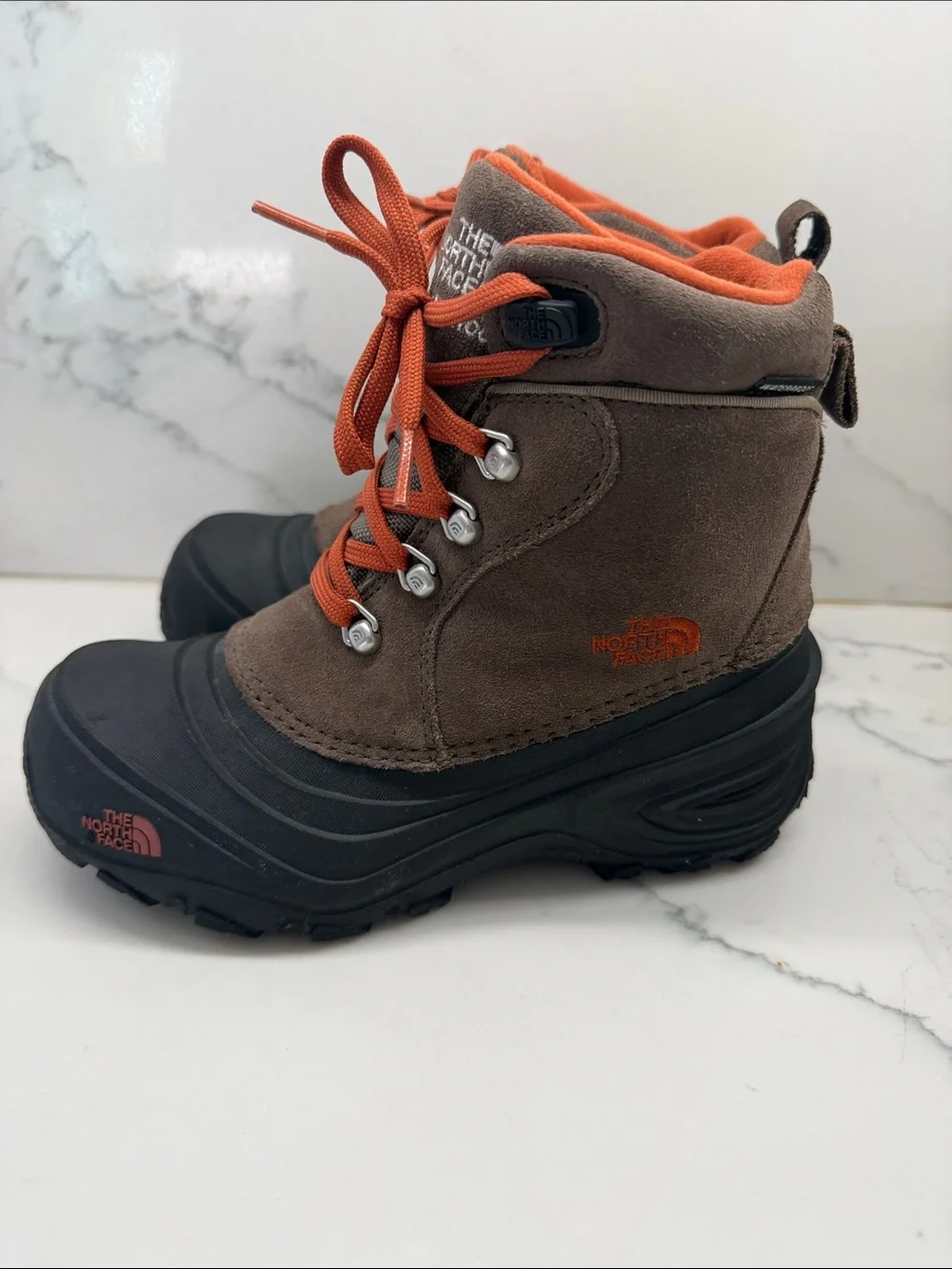 The North Face Brown Suede Kids Boots with Orange Laces
